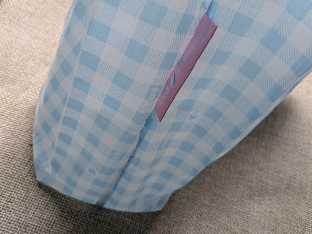 ライトブルーエコバッグのANA Ron Herman Waikikiタグアップ