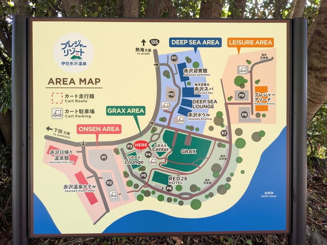 プレジャーリゾート伊豆赤沢温泉のエリアマップ看板。GRAX・ONSEN・DEEP SEA・LEISUREの4エリアが確認できる