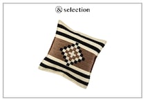 ナバホ族のモチーフをあしらった、〈ラルフ ローレン ホーム〉のスロー ピロー。