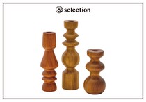 手彫りによる表情の違いを楽しみたい、〈ロミー・オブジェッティ〉のキャンドルホルダー。