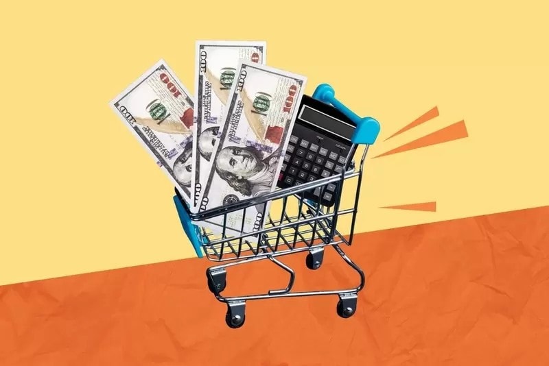 紙幣と買い物カート