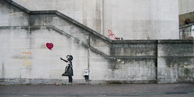 1024px-Banksy_Girl_and_Heart_Balloon_(2840632113)