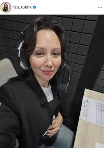 フィギュア元世界女王・トゥクタミシェワ、チェック柄ブラウンのコートあわせ　ミラノで美貌ダダ漏れショット