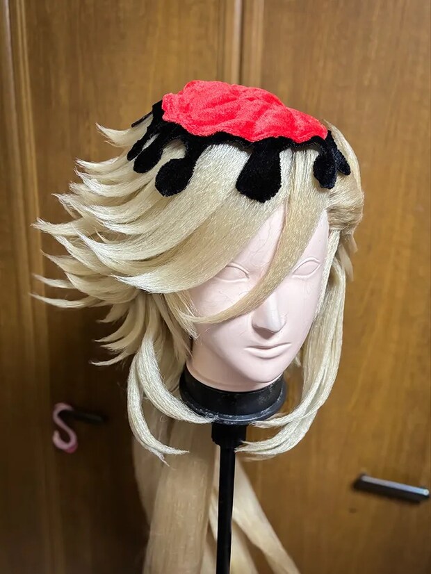 『鬼滅の刃』の童磨のコスプレの写真