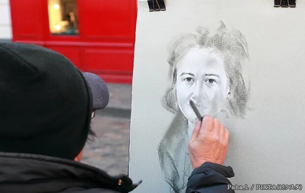 肖像画を描く人の写真