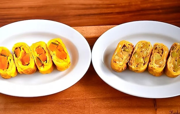 カボチャとサツマイモの玉子焼きを切り分けた写真（撮影：小泉明代）