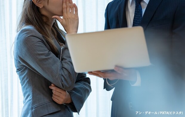 話す社員の写真