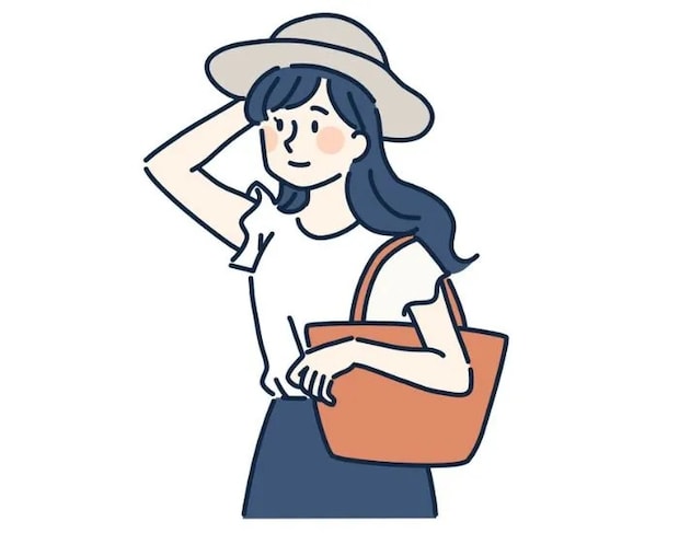 帽子を抑えて歩く女性のイラスト