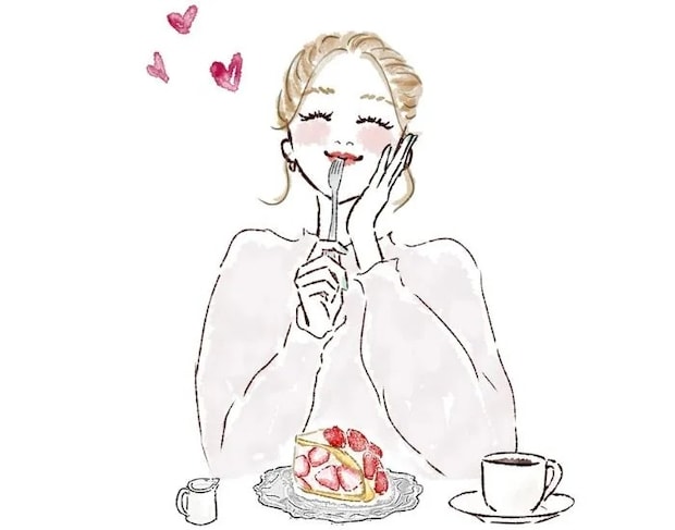 ケーキを食べる女性