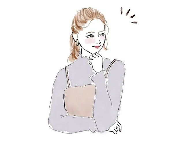 頬杖をつく女性