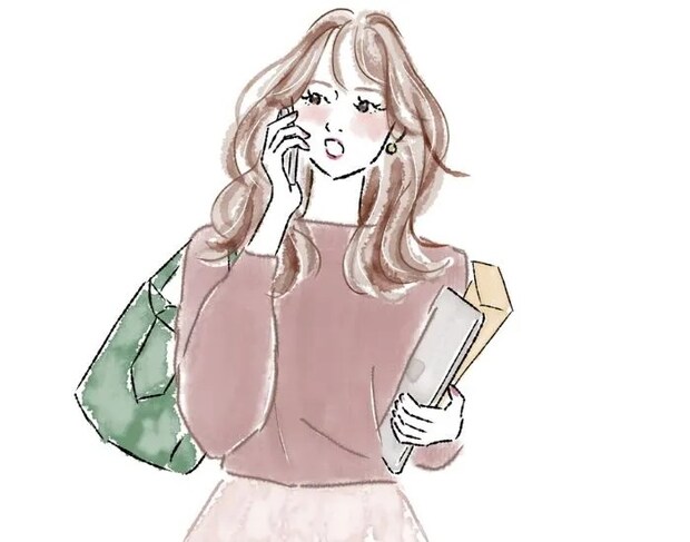 電話をかける女性