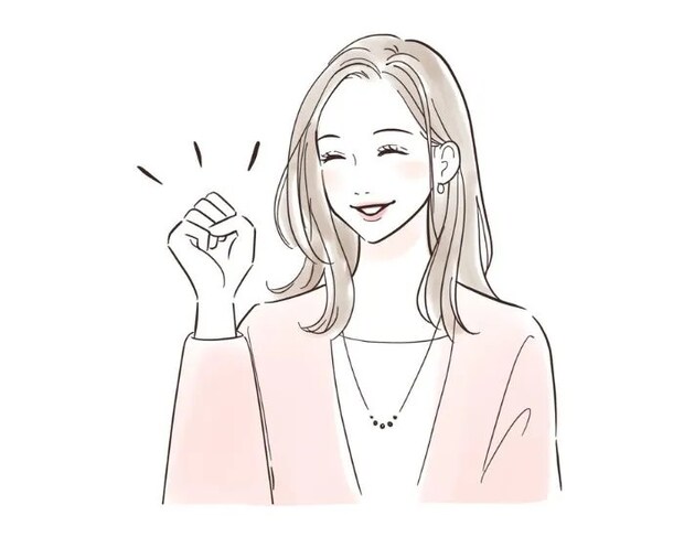 笑顔で応援する女性