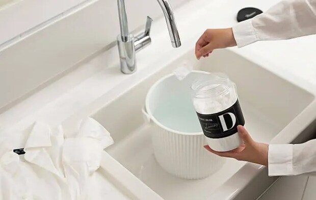 洗剤を入れる写真