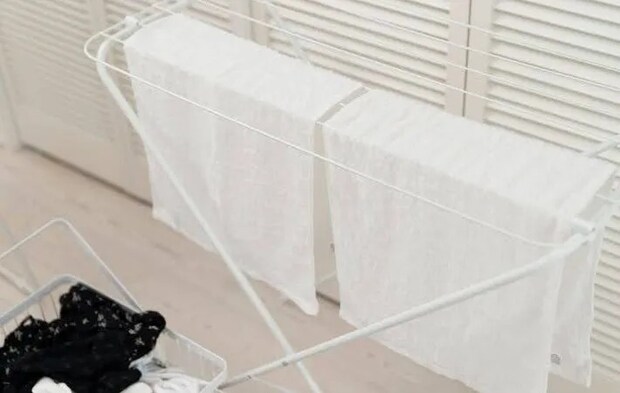 干されたバスタオルの写真