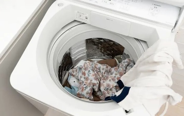 『衣類が入った洗濯機』の写真（撮影：Heulie）