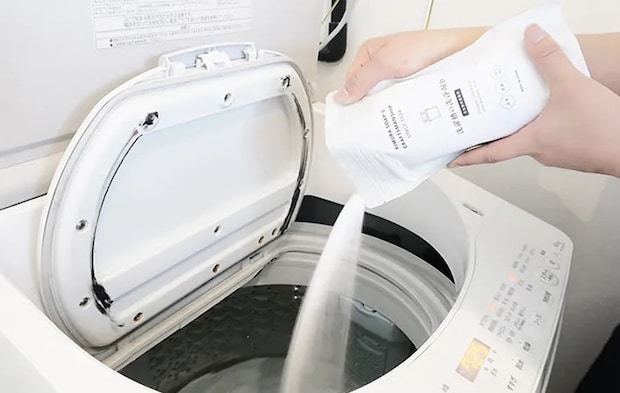 洗濯機と洗剤の写真