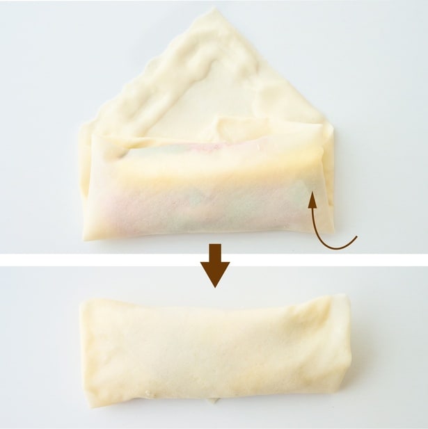 「基本の巻き方」③　手前から少しふんわりと巻き、巻き終わりをしっかり密着させる。