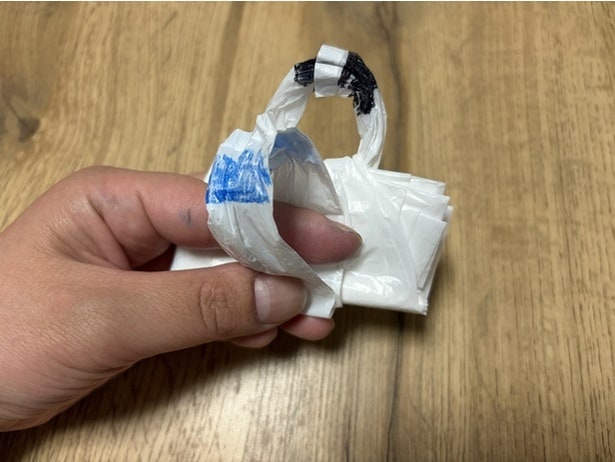 今度は長い持ち手（青）の輪に...（▶次へ）