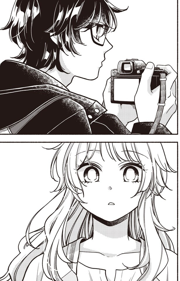 カメラを持つ青年