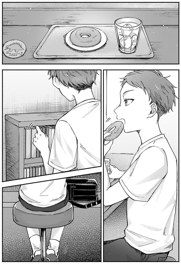 ドーナツを食べる男の子