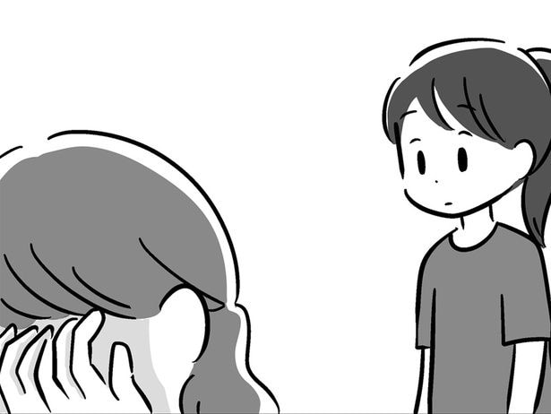 泣き崩れる母