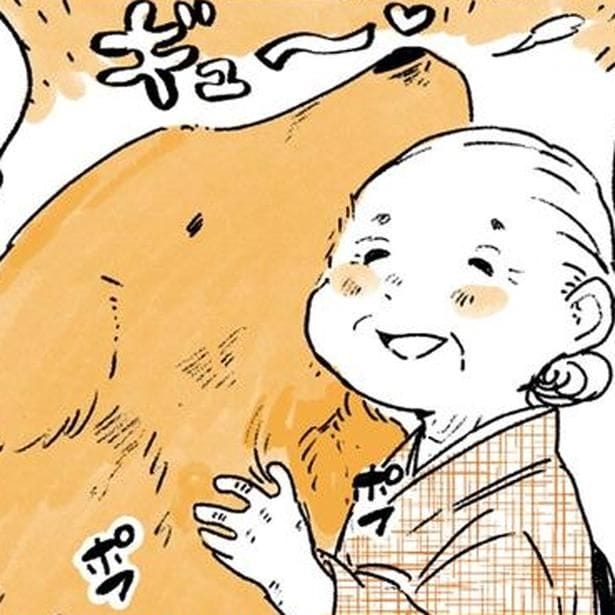 レトリバーを抱きしめるおばあちゃん