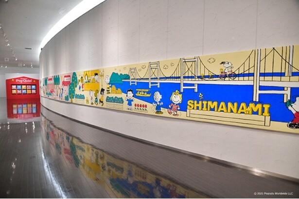 大自然豊かな今治とタオル美術館を背景にした長さ26メートルのタオルアート