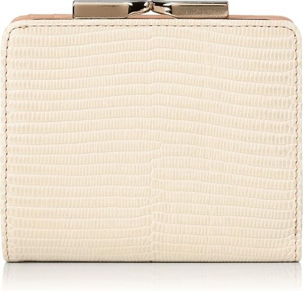 ミニバッグ派も納得の使いやすさ！【トプカピ】の二つ折り財布が洗練デザインで注目度アップ。Amazonで販売中！