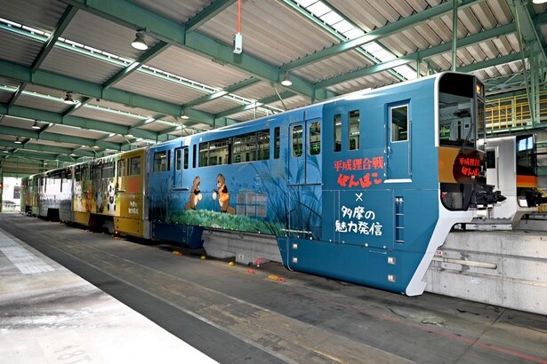 多摩モノレールで『平成狸合戦ぽんぽこ』のフルラッピング車両が期間限定で運行！スタンプラリーも開催中