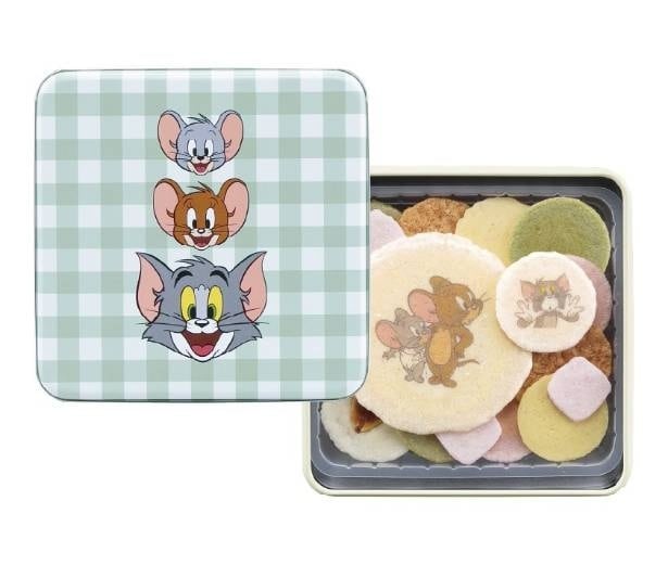 トム、ジェリー、タフィーの表情をデザインしたよくばり缶。プリントえびせんべいやチーズえびせんべいなど、見た目も味わいも楽しめる