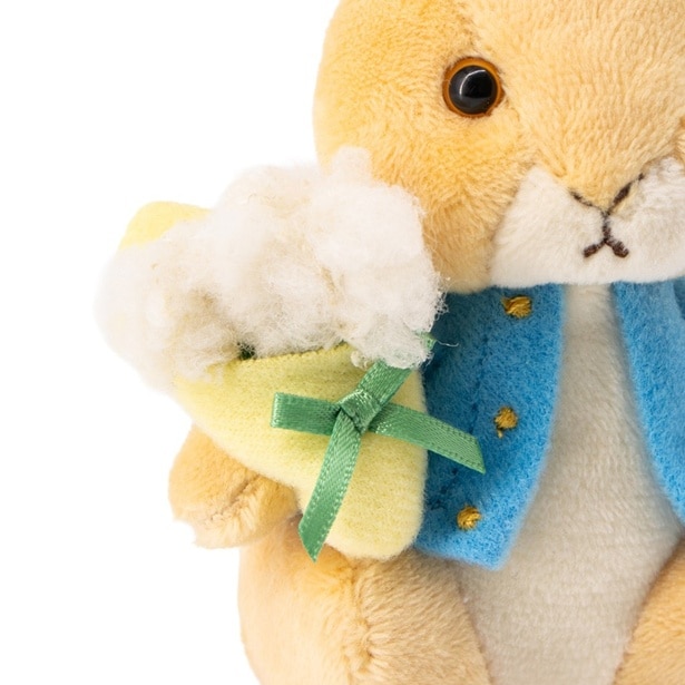 グリーンのリボンで束ねられたラグラスの花束。ふわふわの質感まで丁寧に再現されている