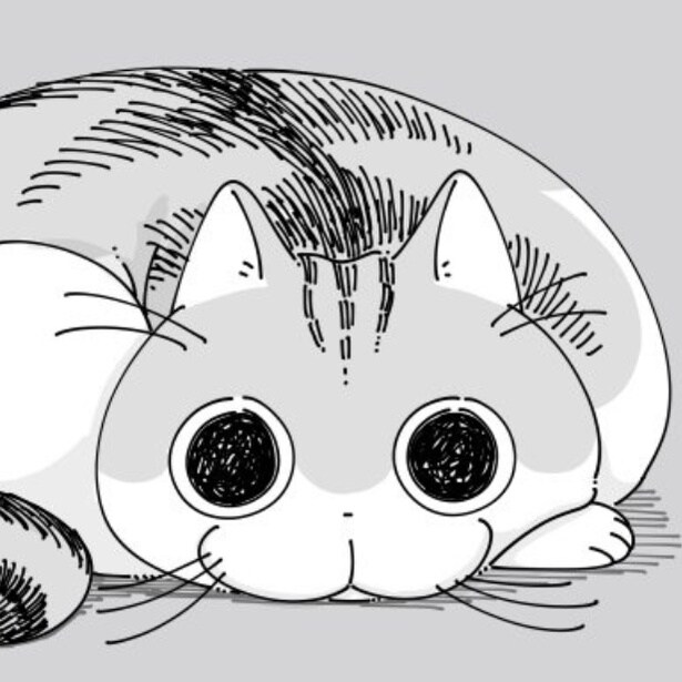 手を枕にしてくつろぐ猫