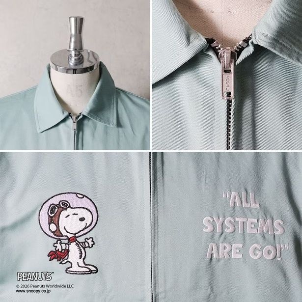 襟元のクリーンなシルエットと、IDEAL社製のヴィンテージライクなジップ、ヘルメットを被ったスヌーピー&「ALL SYSTEMS ARE GO!」の刺しゅう