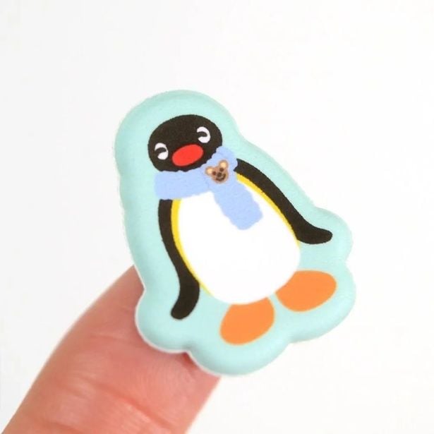 マフラーをよ~く見ると、クマのぬいぐるみがちょこんとついている