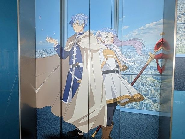 59階エレベーターの扉装飾(ヒンメル＆フリーレン)