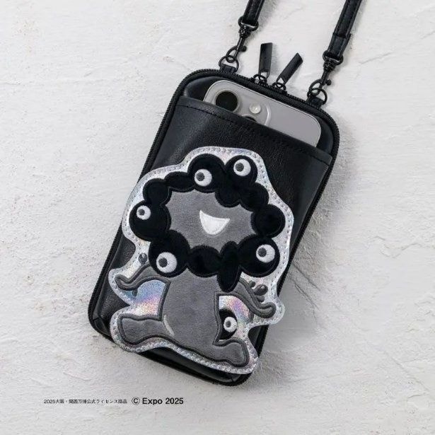 TJ MOOK「大阪・関西万博公式キャラクターミャクミャク スマホポシェットBOOKモノクロver.」(4389円)。2025年12月23日発売