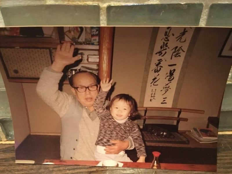 幼少期の店主・塩本功太郎さんと祖父・望月金次郎さん