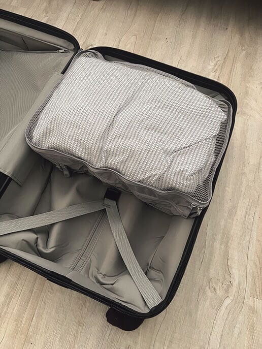 ポリエステル たためる 仕分けケース ダブルタイプM　「スーツケースの中で衣類がきちんと固定されるため、到着後の荷物整理が格段にスムーズになりました」（無印良品愛好家 ムタログさん）