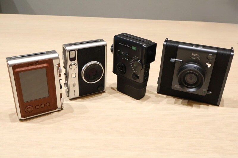 左から『instax mini Evo』BROWN・BLACK、『instax mini Evo Cinema』、『instax WIDE Evo』