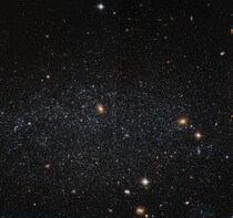 星がまばらな矮小不規則銀河「しし座A」　ハッブル望遠鏡が撮影