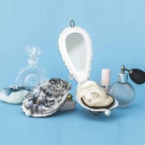 フェリシモの牡蠣への愛が止まらない…！ 今度は「牡蠣そっくりのミラー付きコンパクト」を発売