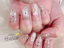 【オケージョンネイル】春の始まりはキラキラゴールドで！リボンとドットがアクセント