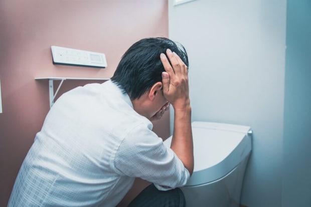 気分不良の男性