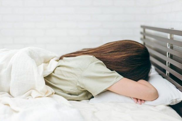 怠そうな女性
