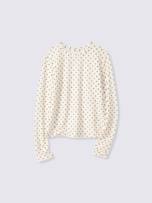 クリーム色に黒いドット柄の長袖シアートップス