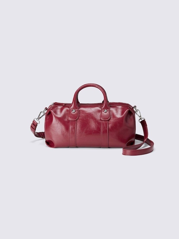 鮮やかなレッドのヴィンテージ風ダッフルミニバッグ