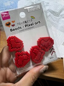 「これがミャクミャクになる気しかしない」　ダイソーで発見したビーズ、色を塗ると……　「えええ」ネイリストの“天才的リメイク”に称賛【万博】