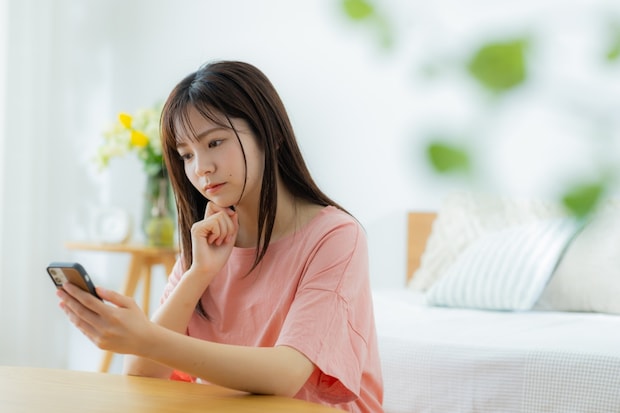 スマホ　ショック　女性　写真