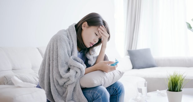 体温計　熱　女性