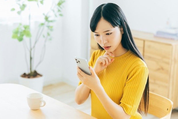 スマホ　女性　嫌
